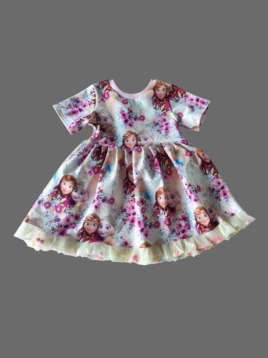 Kleita "Anna un Elza"  ar krasainām tekstilbumbiņām